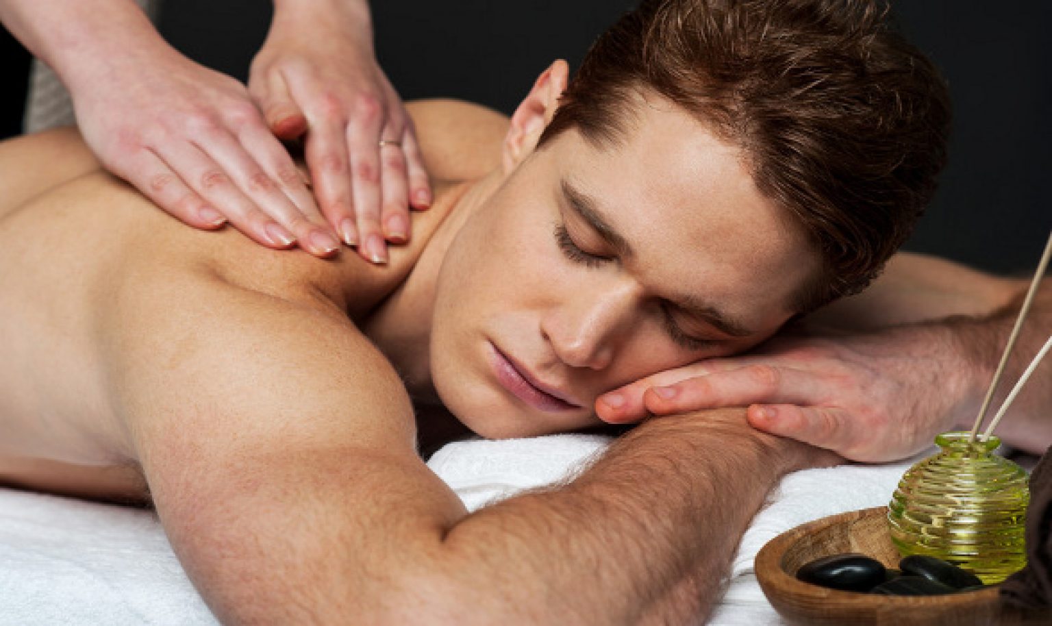 Men massaging men